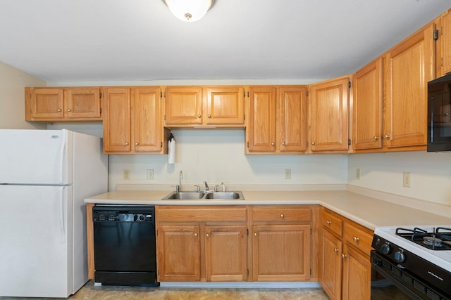 kitchen with sink and black appliances