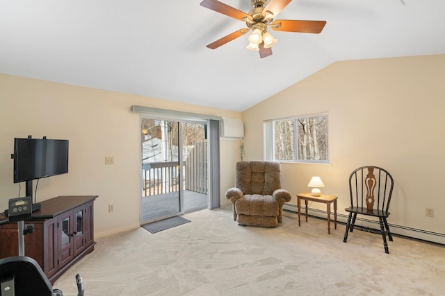 sitting room with lofted ceiling, light carpet, a wealth of natural light, and a baseboard radiator