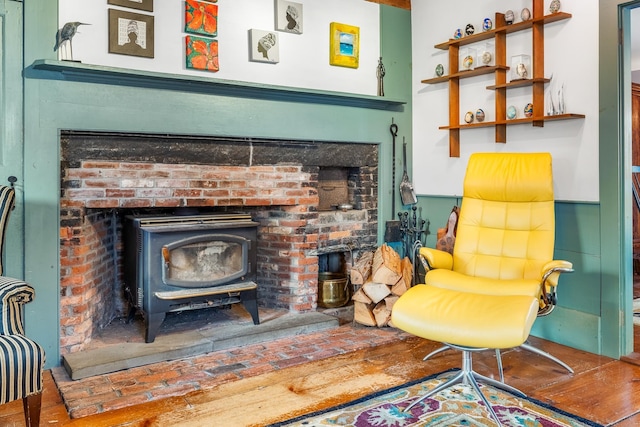 living area featuring a wood stove