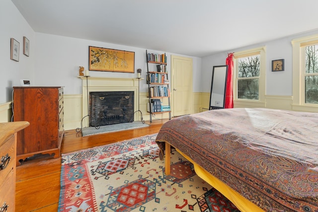 bedroom with hardwood / wood-style flooring