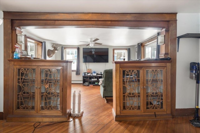 49 Eastern Ave, Richford, VT 05476 - hallway with hardwood / wood-style floors and baseboard heating