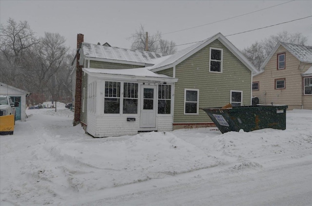 49 Eastern Ave, Richford, VT 05476 - view of snow covered back of property