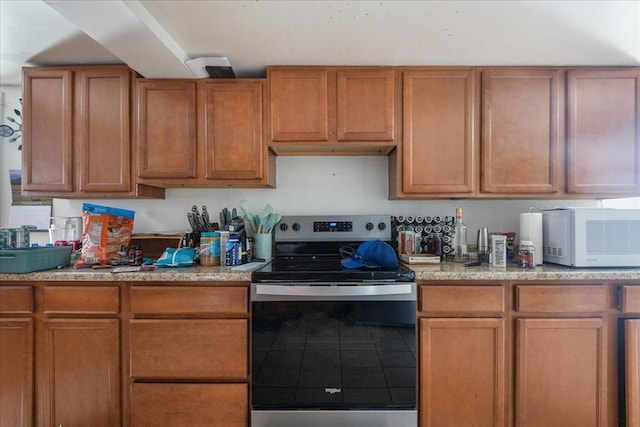 49 Eastern Ave, Richford, VT 05476 - kitchen with tile patterned flooring and stainless steel range with electric cooktop