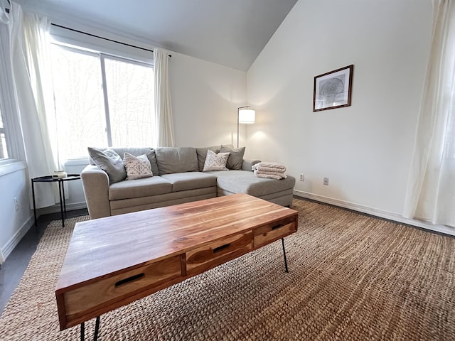 living room with vaulted ceiling