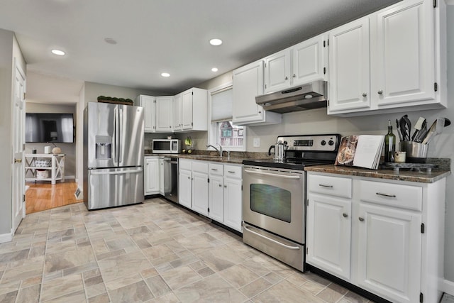 kitchen with white cabinetry, sink, and appliances with stainless steel finishes