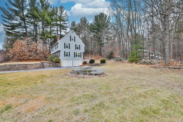 view of yard with a garage