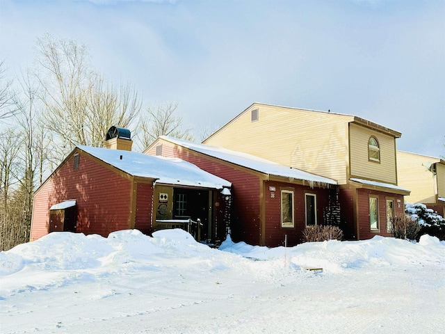 view of snow covered property