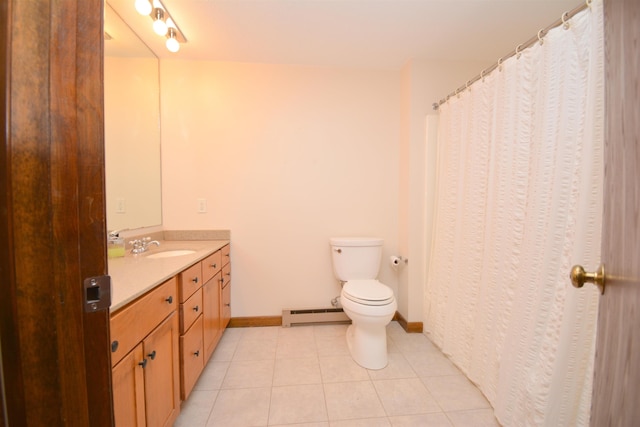 bathroom with baseboard heating, tile patterned flooring, vanity, and toilet