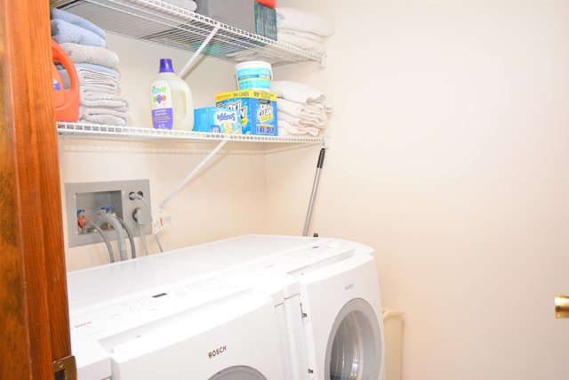 laundry room with washer and dryer