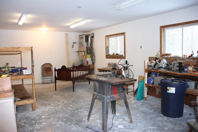 137 Modock Hill Rd, Conway, NH 03818 - miscellaneous room featuring a workshop area and unfinished concrete flooring