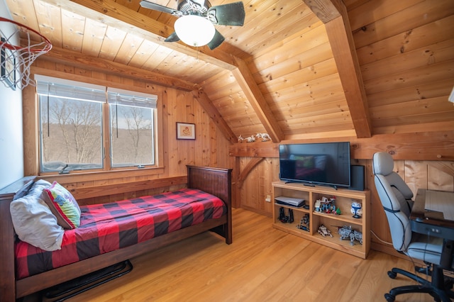 43 Upton Rd, Dover, VT 05356 - bedroom with wooden ceiling, lofted ceiling, wood finished floors, wood walls, and a ceiling fan