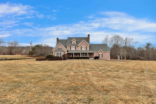 view of front of home with a front lawn