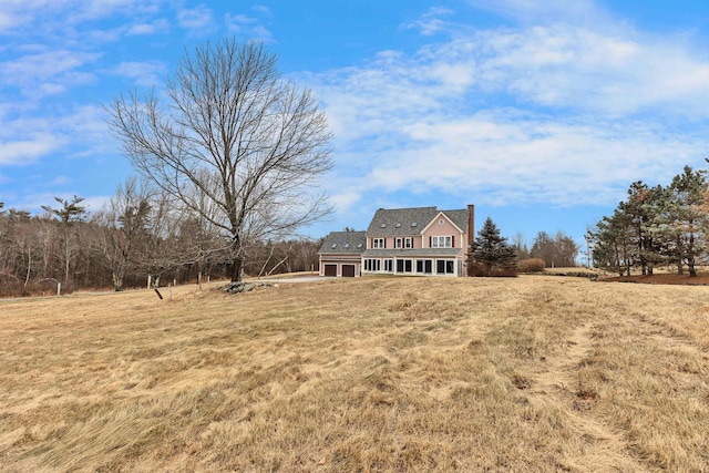 exterior space featuring a front lawn