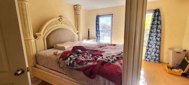 bedroom featuring hardwood / wood-style flooring