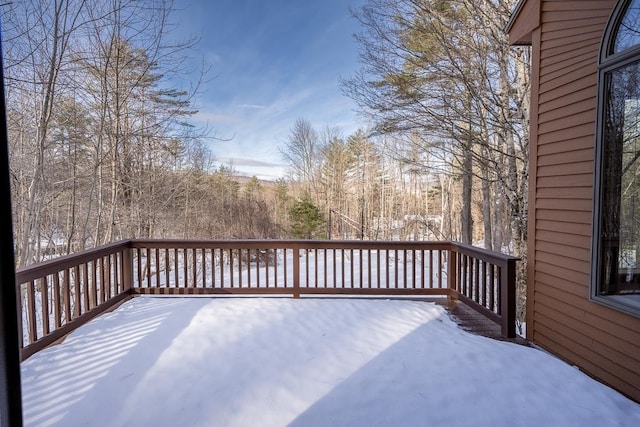 view of snow covered deck