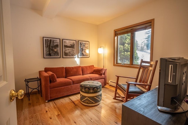 living room with beam ceiling and light wood-type flooring