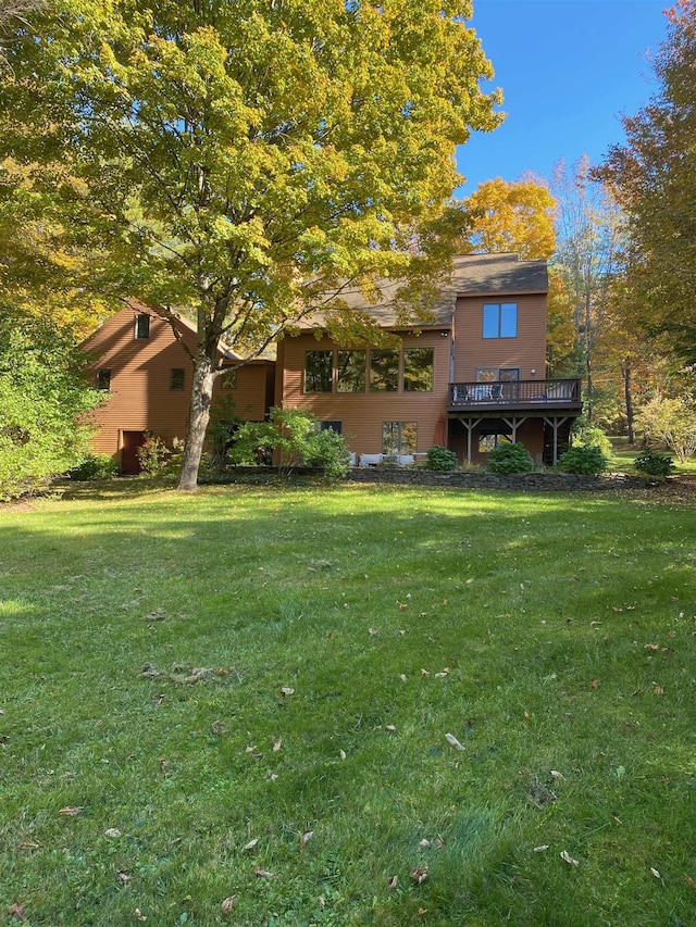 view of yard with a wooden deck