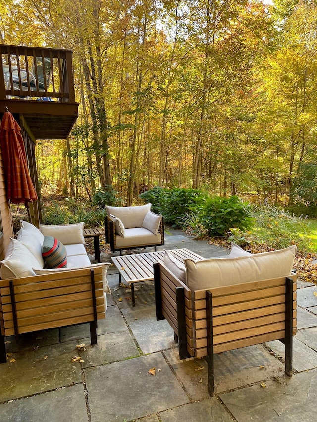 view of patio / terrace featuring an outdoor living space and a balcony