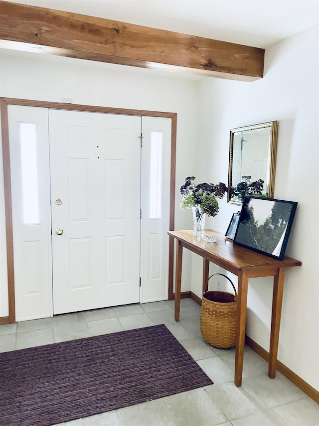 entrance foyer with beam ceiling