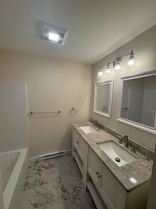 bathroom with vanity and a baseboard radiator