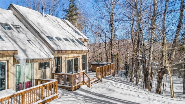 view of snow covered deck