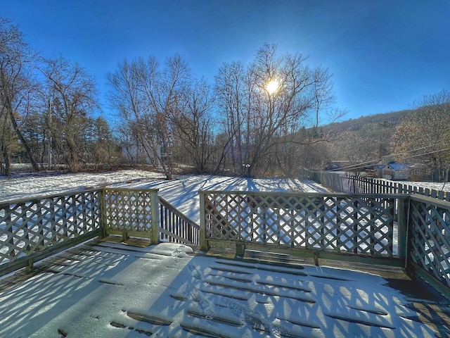 view of snow covered deck