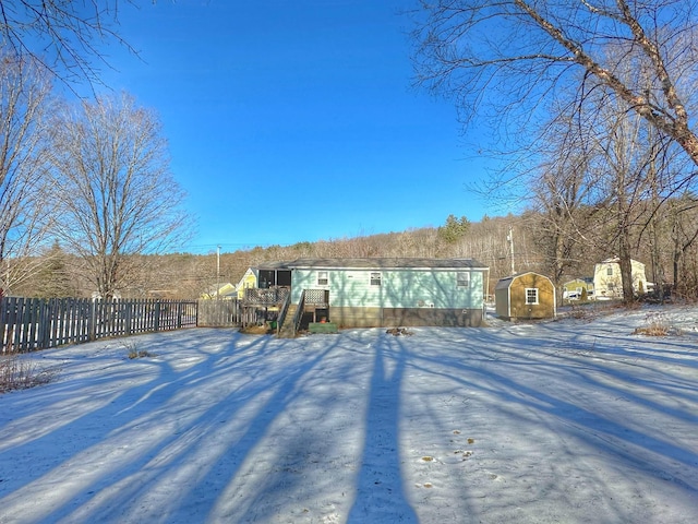 view of snow covered house