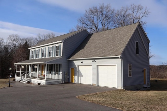 view of front of house with a porch, driveway, a shingled roof, and a garage