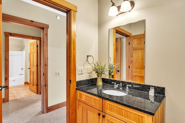 bathroom with vanity and  shower combination