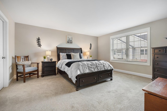 bedroom with light colored carpet