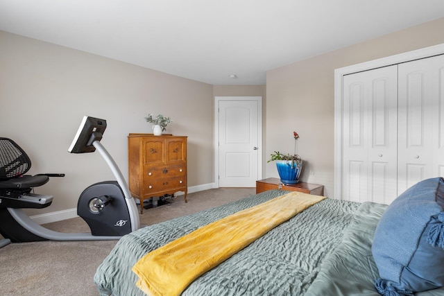 carpeted bedroom with a closet