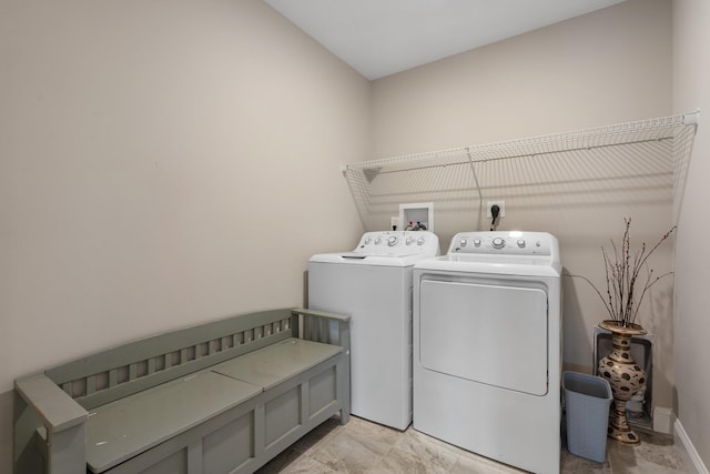 laundry area featuring separate washer and dryer