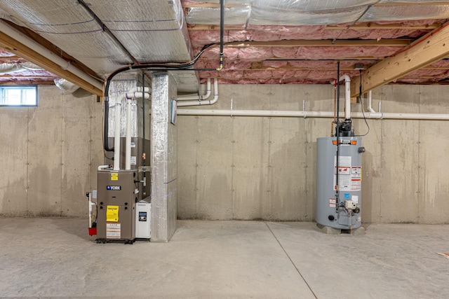 basement with gas water heater and heating unit