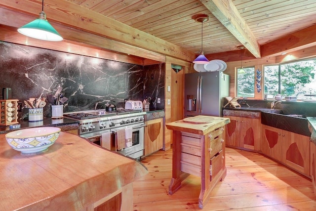 kitchen with beam ceiling, stainless steel appliances, decorative light fixtures, and wood ceiling