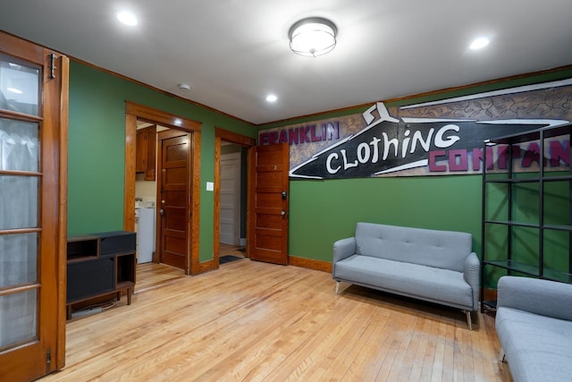 sitting room with light hardwood / wood-style floors