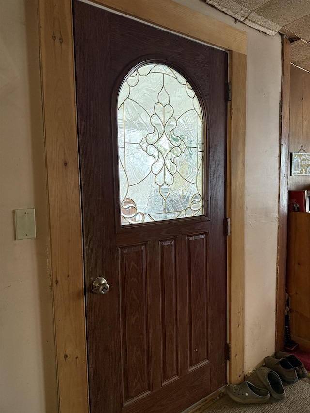 entryway with a drop ceiling