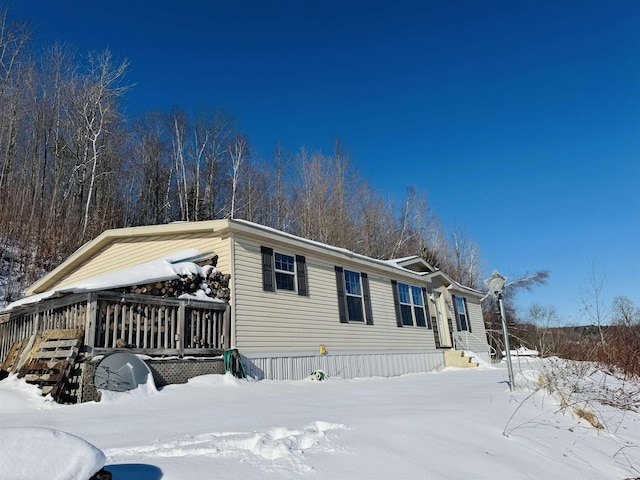 view of snow covered property