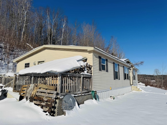 view of front of property with a deck