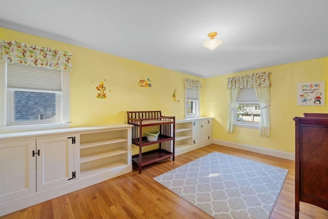 bedroom featuring light wood-type flooring