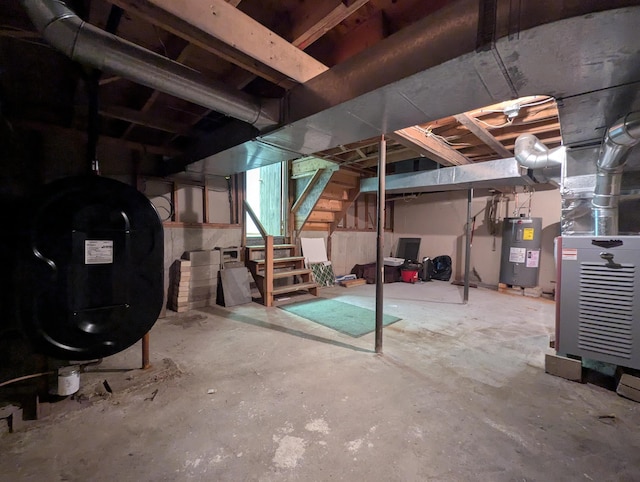 basement with heating unit and water heater