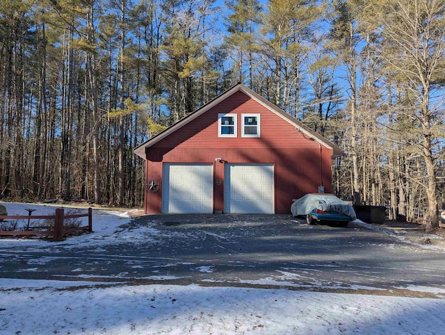 view of snow covered garage