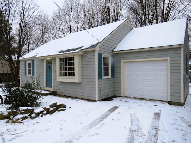 ranch-style home featuring a garage