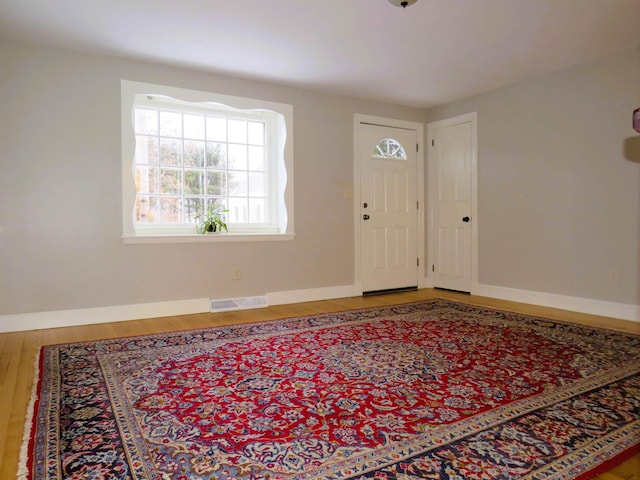 foyer featuring hardwood / wood-style flooring