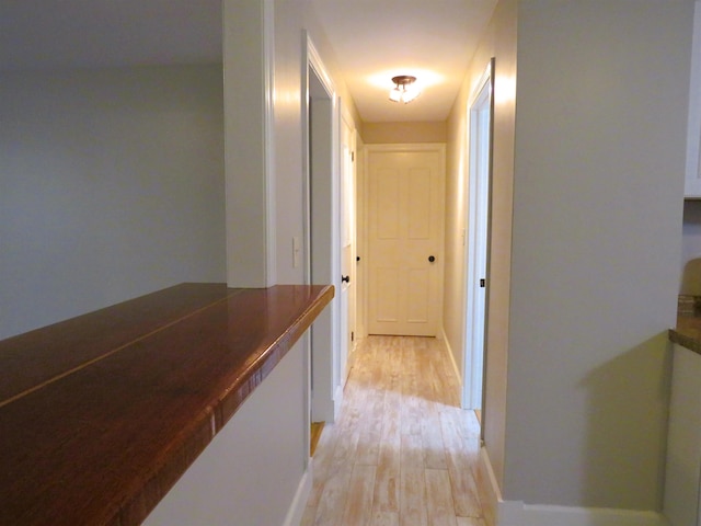 corridor featuring light wood-type flooring