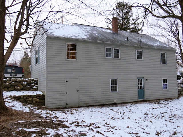 view of snow covered property