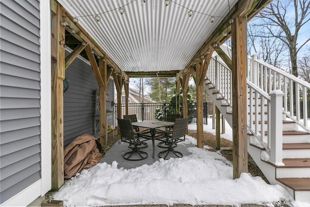 view of snow covered deck