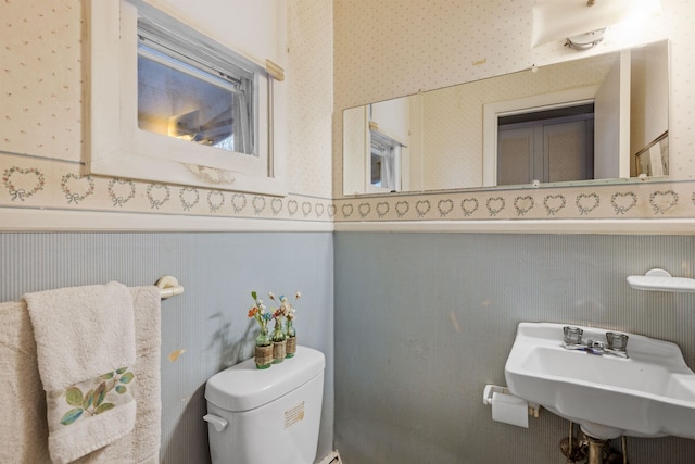 bathroom with toilet and sink