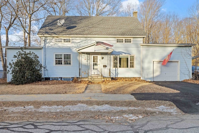 colonial home featuring a garage