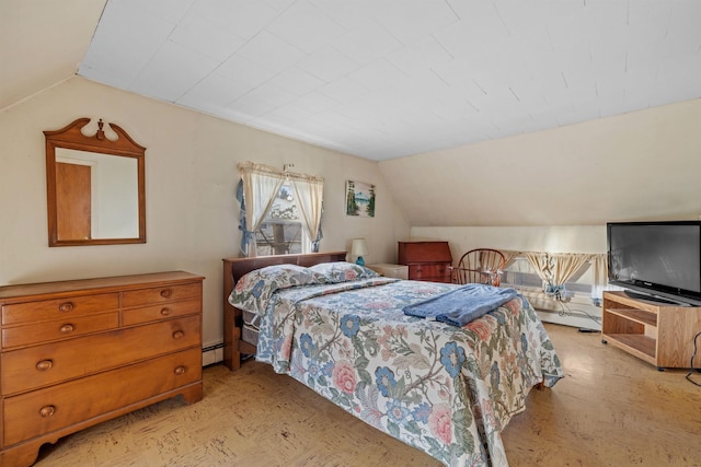 bedroom with lofted ceiling and baseboard heating