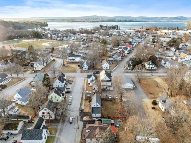 bird's eye view featuring a water and mountain view